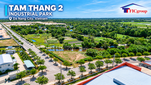 Aerial view of Tam Thang 2 Industrial Park in Da Nang City, Vietnam, featuring landscaped internal roads, green spaces, drainage canals, and surrounding industrial infrastructure