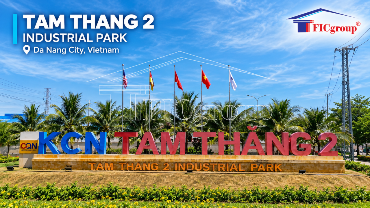 Main entrance signage of Tam Thang 2 Industrial Park in Da Nang City, Vietnam, featuring the industrial park's name, flags, and landscaped surroundings